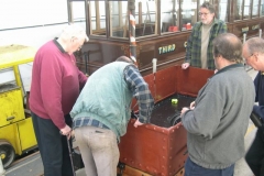 Tuesday, 28.4.15. There is much discussion over how to bolt the body to the frames of the Heritage waggon …