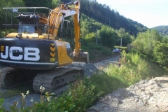 Tuesday, 21.7.2020. A hopeful sign The bigger machine on the Pont y Goedwig Deviation works has been moved – hopefully, to make way for the delivery of stone to site. However, there is still standing water around.