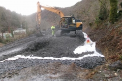 ... and covered with geotextile and the start of fill. A third shelf was prepared but Aberllefenni Quarry's loading shovel broke down and so work was held up on that layer for 24 hours until it was fixed ...