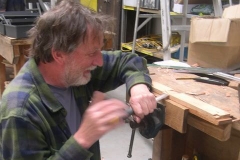 … while Neil pays homage while cutting out for the leather window straps in carriage No. 22