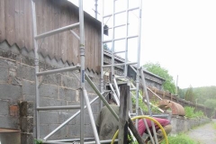 The tower scaffold has been set up by two John's to access the leaking roof of Stella's Shed ...