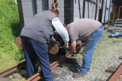 Tuesday, 30.5.2023. Bill and Mark set to, removing a dumb buffer from van No. 221 ...