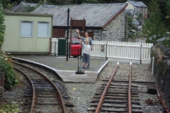 Jack and Jane wave goodbye to the train.