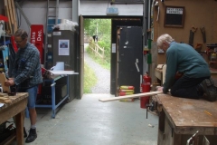 Meanwhile, at Maespoeth, Tony and Peter prepare and prime replacement timber fence palings …