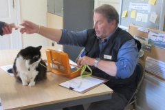 Event organiser Bill was manning the door under the supervision of a feline master ...
