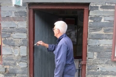 Thursday, 24.8.2023. Paul gives the S&T door and frame a long needed coat of gloss paint ...
