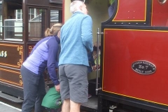 Great interest is shown by some passengers in the cab of No 7 upon the train's return ...