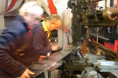 Bob and Chris prepare to drill holes for buffers in carriage No. 20’s buffer beams …