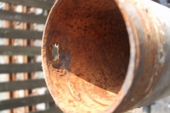 A worrying sign – the 2007 pipe is rusted through (today replaced with a new galvanised pipe).