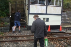… as Tony and Stevie replace a rotting step on the Signal Box steps.