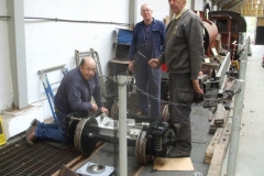 Saturday, 20.10.2018. At Maespoeth, Ian, Andy and Peter work on a bogie for the new carriages ...