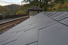 ... and soon the ridge slates are in place ...