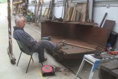 By evening, Adrian has removed the drop side (which had been fixed in position and the end removed for the waggon to be used as a rubbish waggon in Aberllefenni Quarry), and is about tuckered …