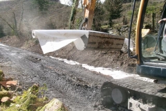 More geotextile is brought forward ...