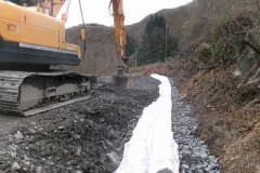 ... is cut to length and laid out (the last section we require on this part of the embankment). The adjacent edge is excavated and filled up to the new drainage stone ...
