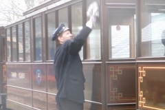 ... while Guard John cleans the carriage windows between other duties!