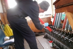 ... while Peter continues painting the Signal Box levers.