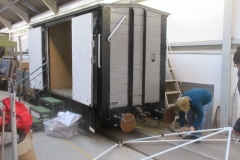 ... on how the frame components go together for the gazebo adjacent to the van to be used as Santa's Grotto.