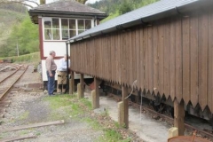 ... while outside, John and Dick are refining drainage arrangements on the Waggon Shelter.