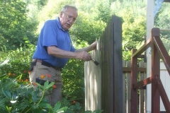 ... while John does the same for the fence around the Signal Box ...