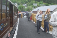 A good crowd waits on Corris platform for the arrival of the first train of the day ...