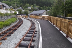 The new fence at Corris Station platform, complete with a coat of preservative, with thanks to the Talyllyn Railway tracksiders.