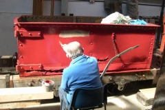In relaxed mode, one of the Heritage waggons receives a coat of paint to arrest corrosion.