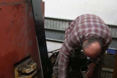 … while adjacent, Charles is painting the rear of the new buffer beams for carriage No. 20 …