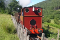 … and after an unannounced practical test for Trainee Guard Tom Gupta, No. 7 and train returns from Corris, supposedly empty coaching stock but with some very patient passengers!