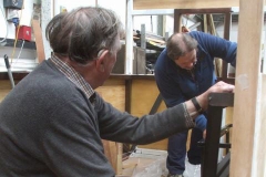 Dick and Bill prepare to add internal panelling to carriage No. 23 …