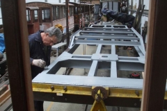The frames of No. 24 have been turned again, and Peter has almost finished giving them a coat of primer, as seen from No. 23 adjacent.