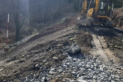 ... with the excavated material being used to increase the height of the embankment ... (RE)