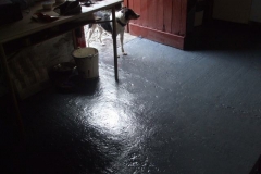 Over the holiday period, Tony has painted the floor of the S&T Shed, which should ease the task of cleaning it. Mollie checks that the paint is dry.