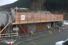 Wednesday, 28.2.2018. Yesterday, after the snow had cleared sufficiently, the front of the Museum was scaffolded and today a good start has been made by morning break on stripping the roof …