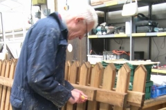 Phil is preparing for painting, the new fence panels destined for Corris Station.