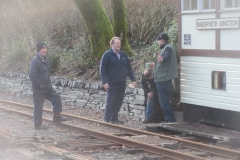 After lunch, there is much discussion on just how to replace the rotten steps to the Signal Box ...