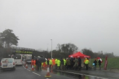 ... but down in Machynlleth, there is a large assembly of hi-viz and other coats as the New Dyfi Bridge is ...