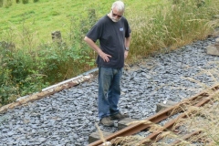 Meanwhile Richard the First looks puzzled as he looks at the approach road to the carriage shed .