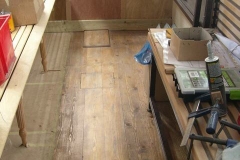 … and the floor in the North compartment of carriage No. 22 is largely cleared, ready for varnishing.