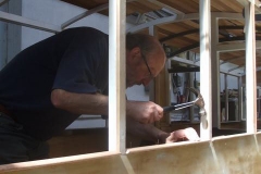 Charles continues to fit window beads to carriage No. 23 …