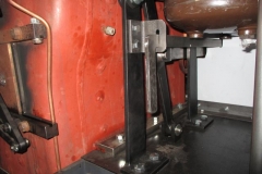 The other end of the reach rod comes neatly through the front of the cab and sits in a bracket mounted on the reversing lever stand.