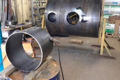 After welding the inner shell holes were cut through outer and inner shells. There is a central tube to clear the steam dome. The tube was made from two rolled plates which were welded together after trimming.