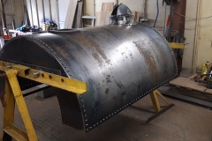 The tank with most of the rivets welded in, the cast iron pocket in place and the tank filler fabricated
