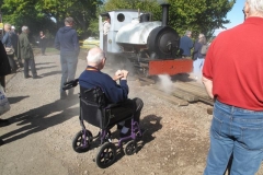 The Falcon in steam! Alan Keef Limited Open Day. Saturday 24.9.2022. Peter Guest looks on as the Falcon locomotive makes several passes on the temporary track laid by Keefs.